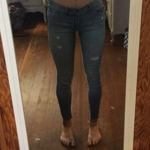 Distressed/ripped Hollister jeans.